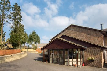 Community invited to visit local care home – which has its own library, hair salon and cafe