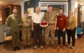 Care Home Residents Make Knitted Poppies.