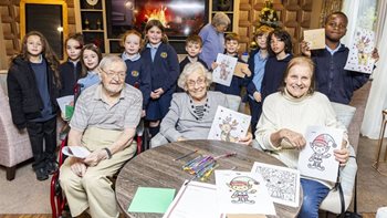 Schoolchildren join Cardiff care home for journey into Christmas past