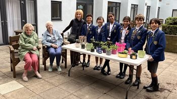 Cheadle Hulme care home residents team up with school children for a DIY project