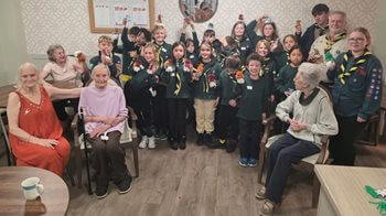 Scouts join Chingford care home for journey into Christmases past 