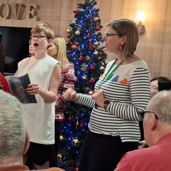 Local schoolchildren join Kingston Vale care home for a journey into Christmas past