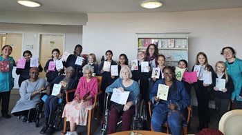 Local schoolchildren join Slough care home for a journey into Christmases past