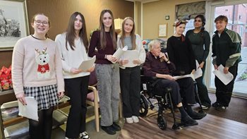 School joins Leamington Spa care home for a journey into Christmas past