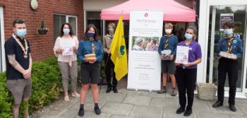 Cupcakes for a good cause – Care home residents and local scouts bake up a storm