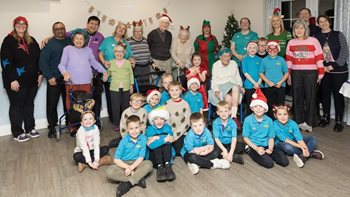 Scouts join Thorrington care home for journey into Christmas past