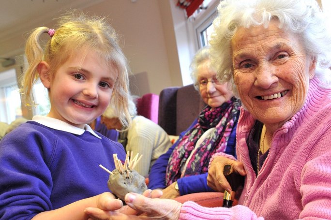 Domestic Bank - pupil-juliet-with-mills-meadow-resident-jean-1 image