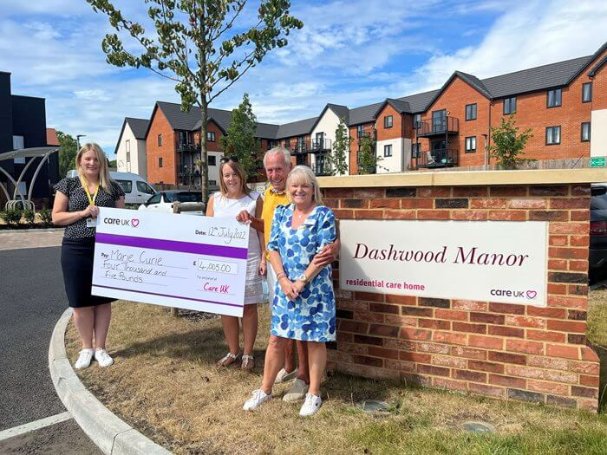 Care Assistant Nights - Dashwood - Dennis cheque for Marie Curie