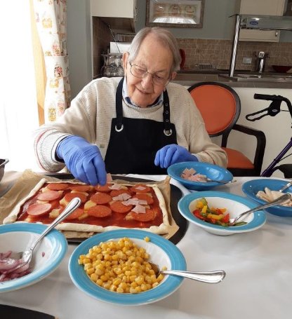 Care Assistant - making-pizza image