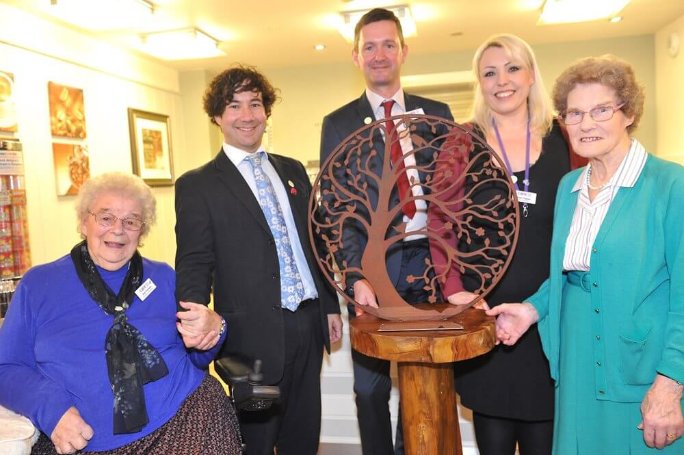 Receptionist - unveiling-of-tree-of-life-statue-by-residents-jean-fincham-and-mary-fulham-with-steyn-phillip-katy i