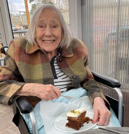 Care Assistant - Mills Meadow - enjoying cake